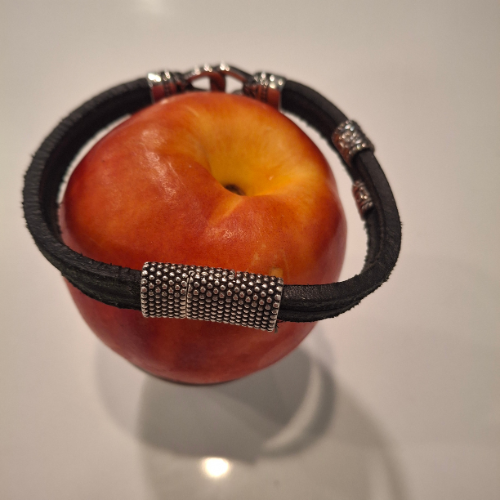 Double suede strap bracelet with Celtic iron applications