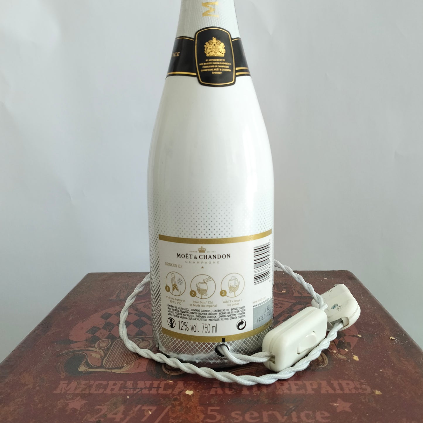 Close-up of Moët & Chandon Ice Imperial label on lamp base