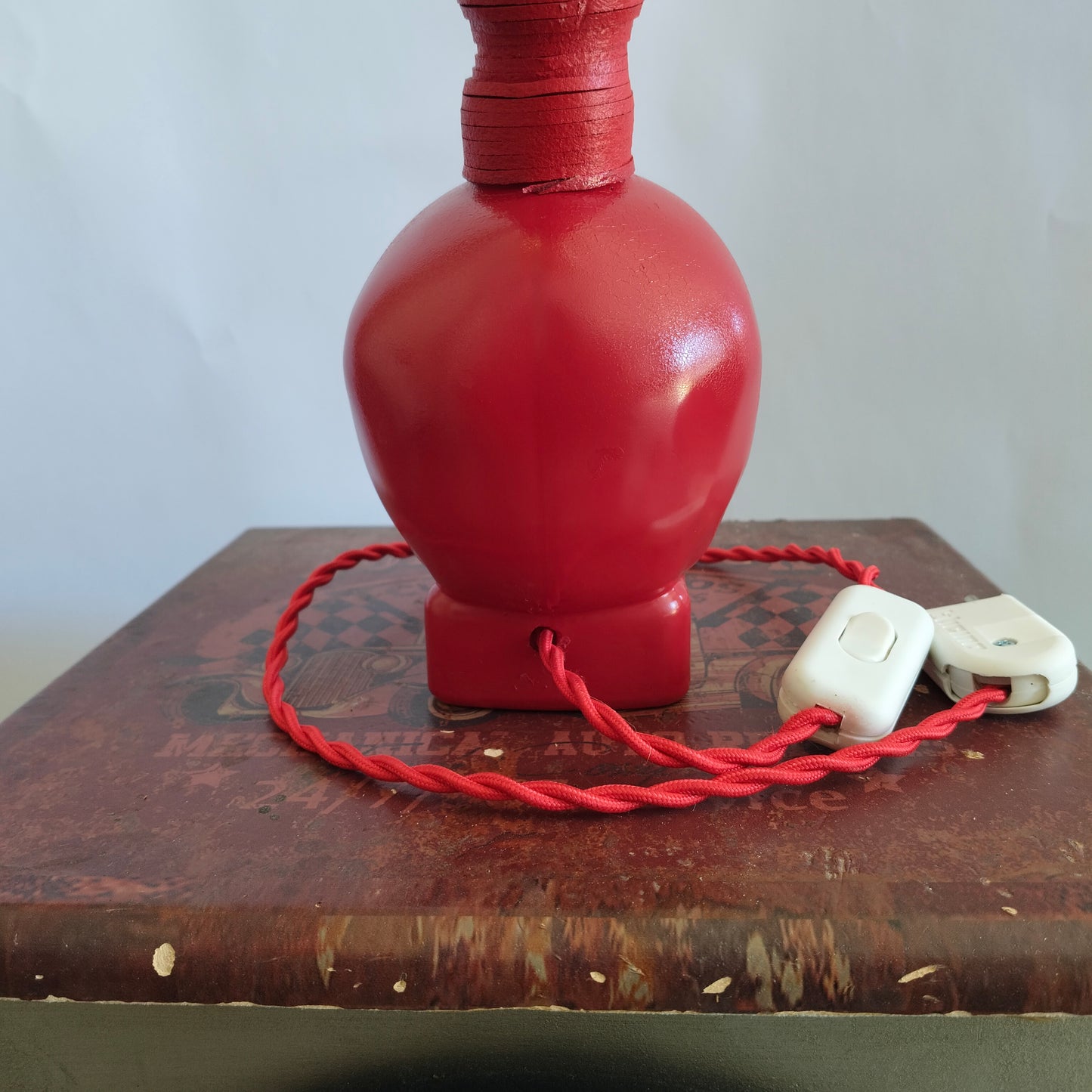 Upcycled Crystal Head Vodka skull lamp painted fire red