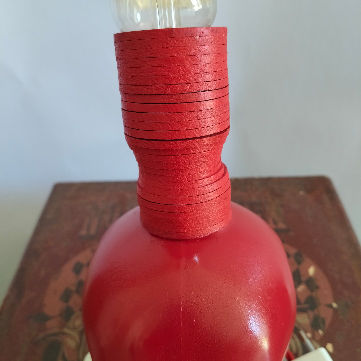 Total red skull lamp with LED love light on table