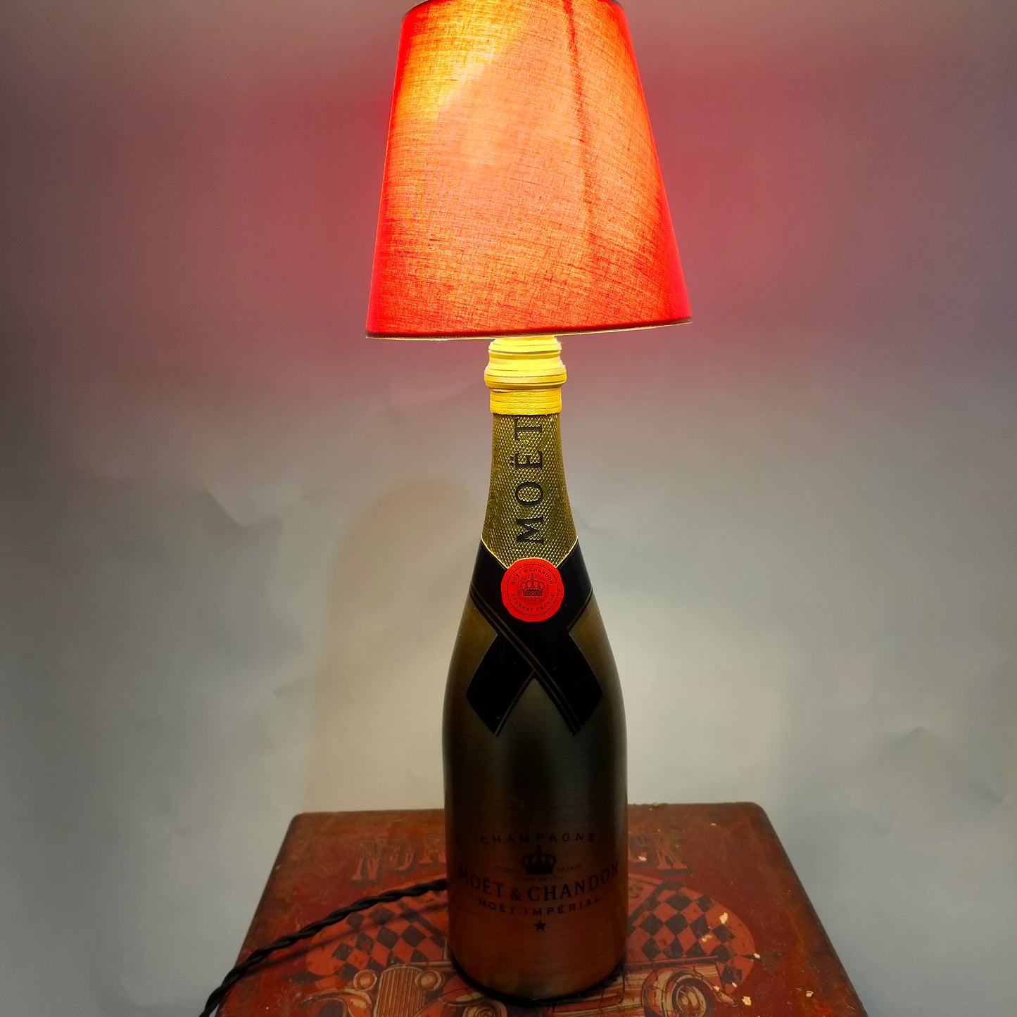 Handmade table lamp crafted from Moët & Chandon Gold Sleeve
