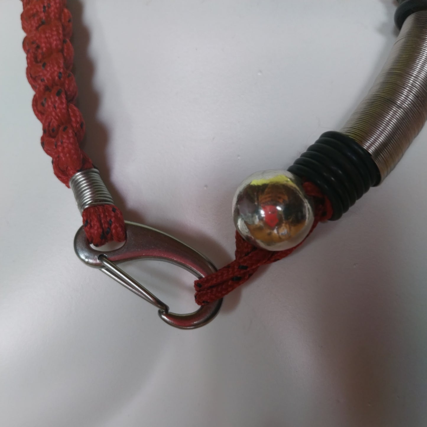 Artisanal Urban Necklace with steel spring and bolt design