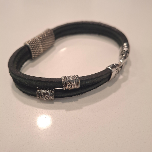 Viking style bracelet with engraved iron armor clasp
