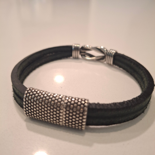 Viking inspired suede bracelet with armor style clasp