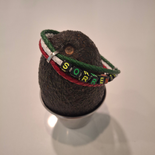 Side view of Sentimento Bracelet showing the colorful letters.
