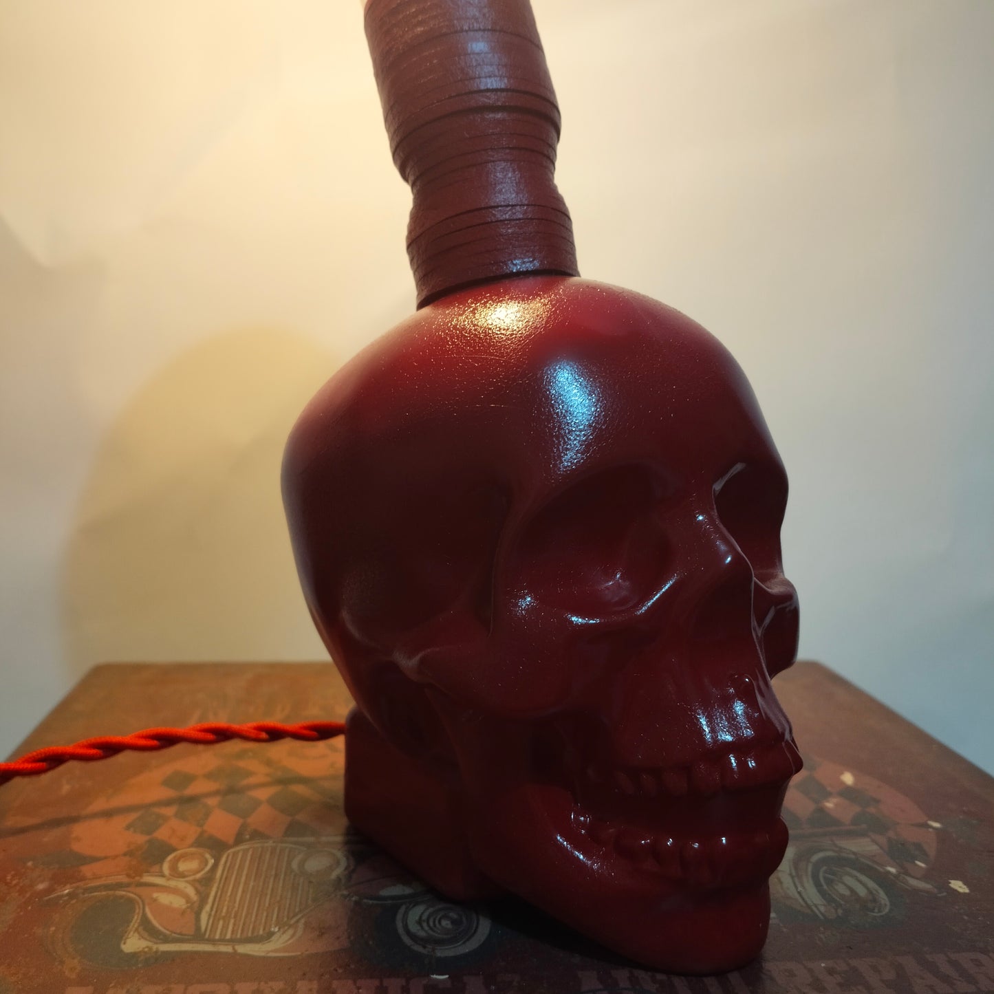 Crystal Head skull lamp painted red with LED warm light