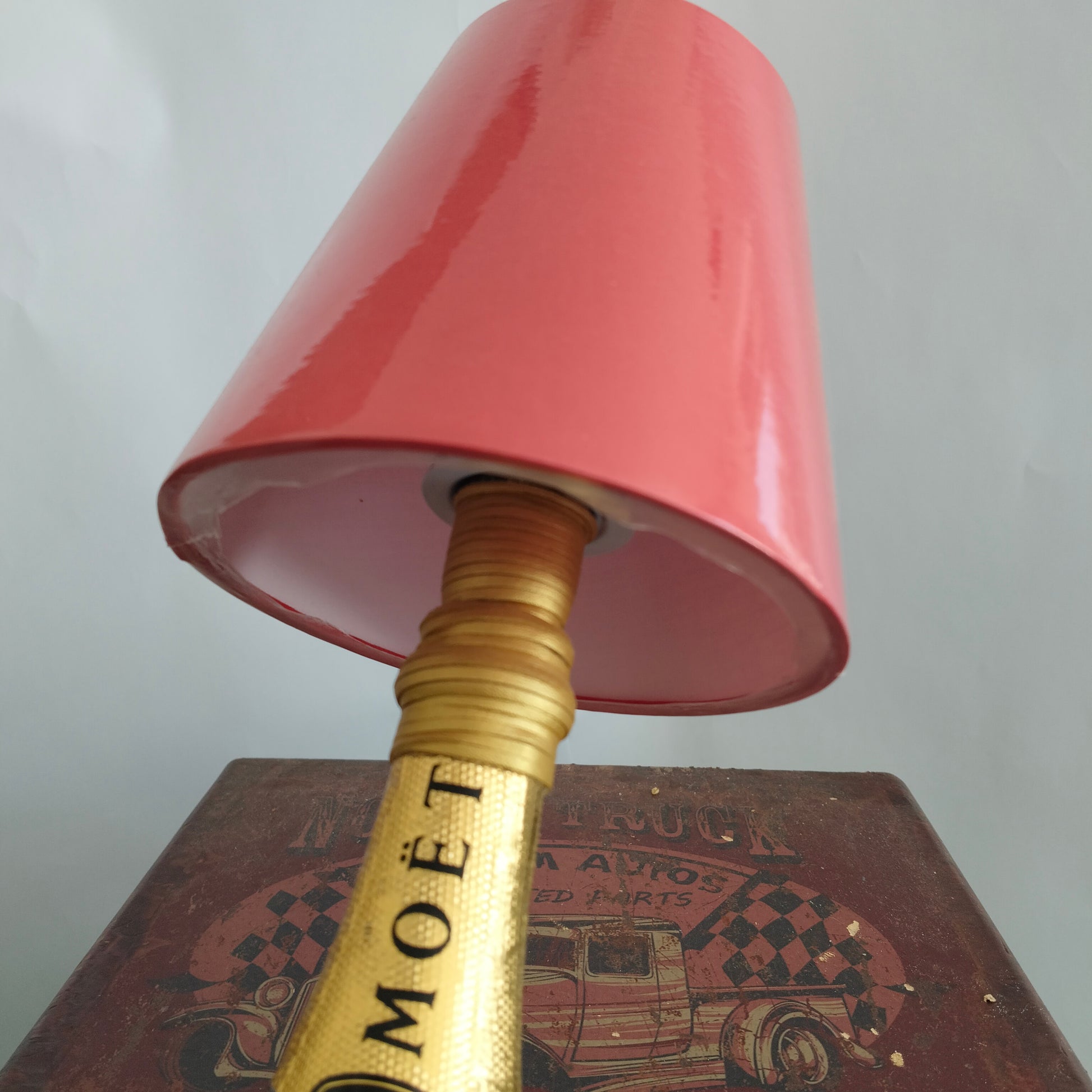 Elegant champagne bottle lamp with luxury red lampshade