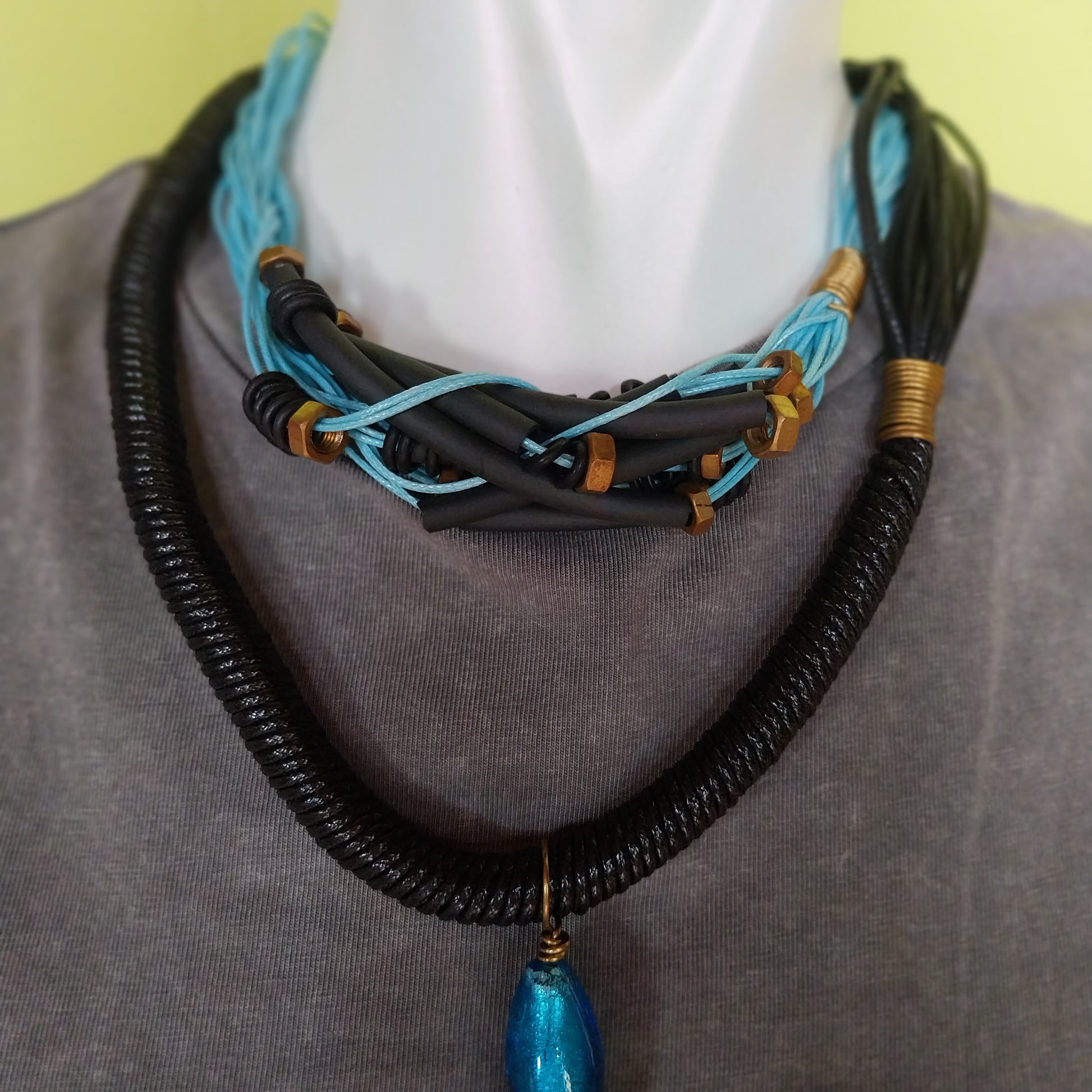 Sustainable artisanal necklace with brass bolts and glass beads