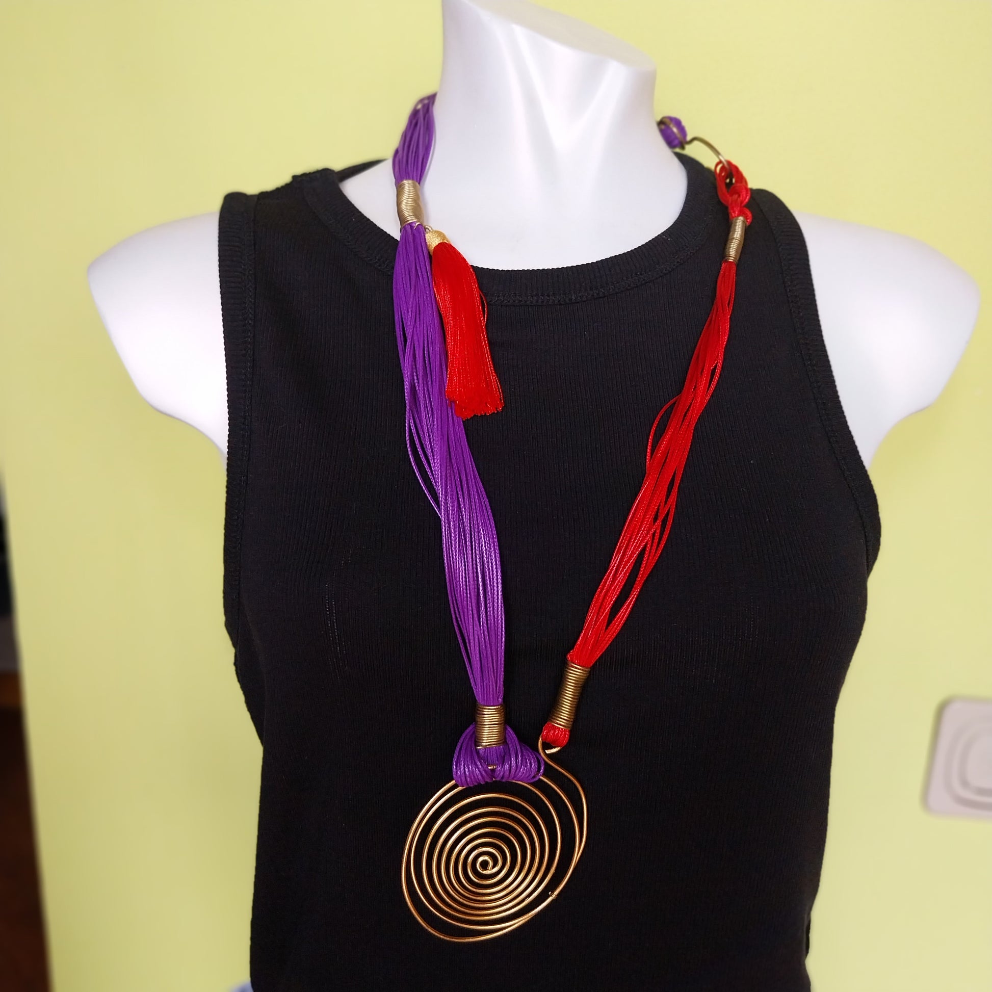 Spirale Necklace handmade with violet and red waxed cords